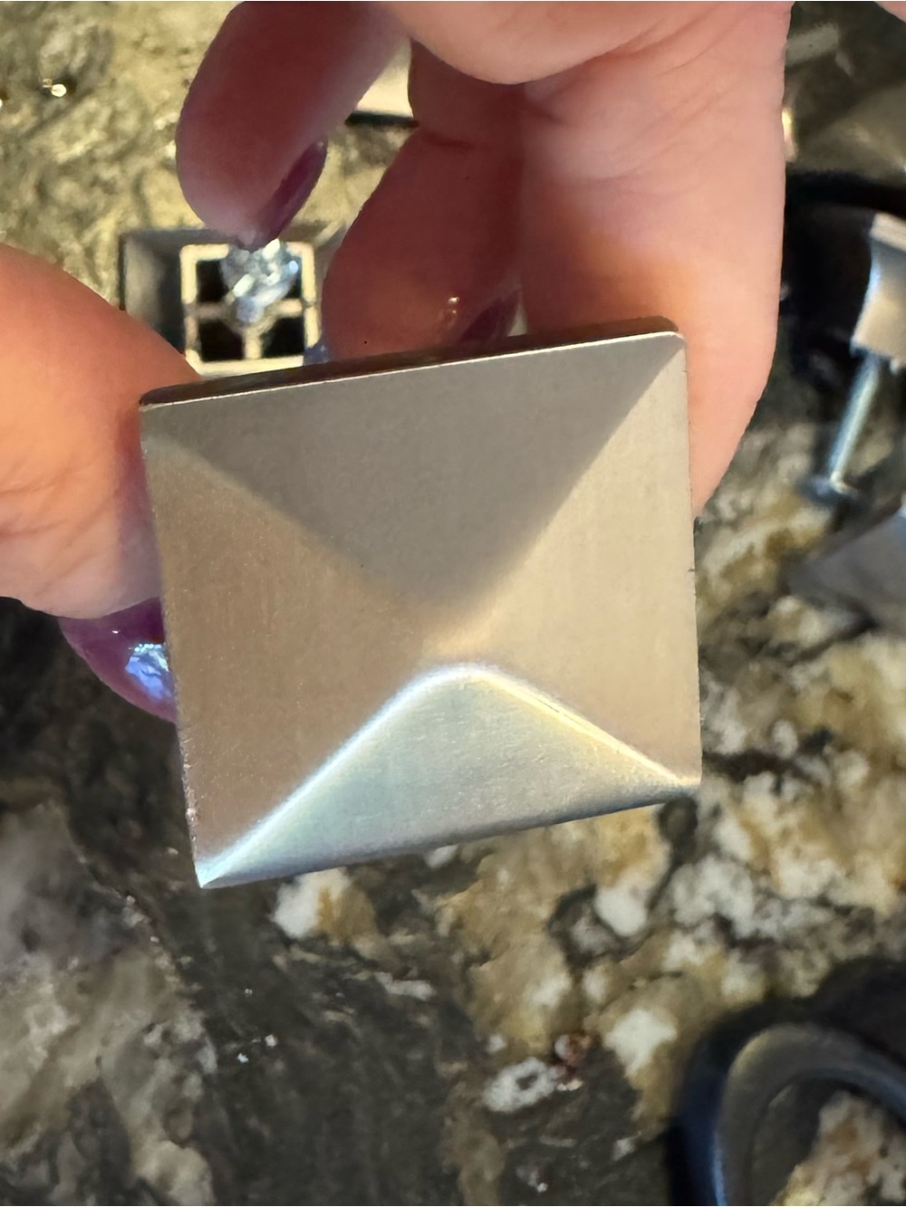 Set of 13 brushed nickel square-pyramid cabinet and drawer knobs